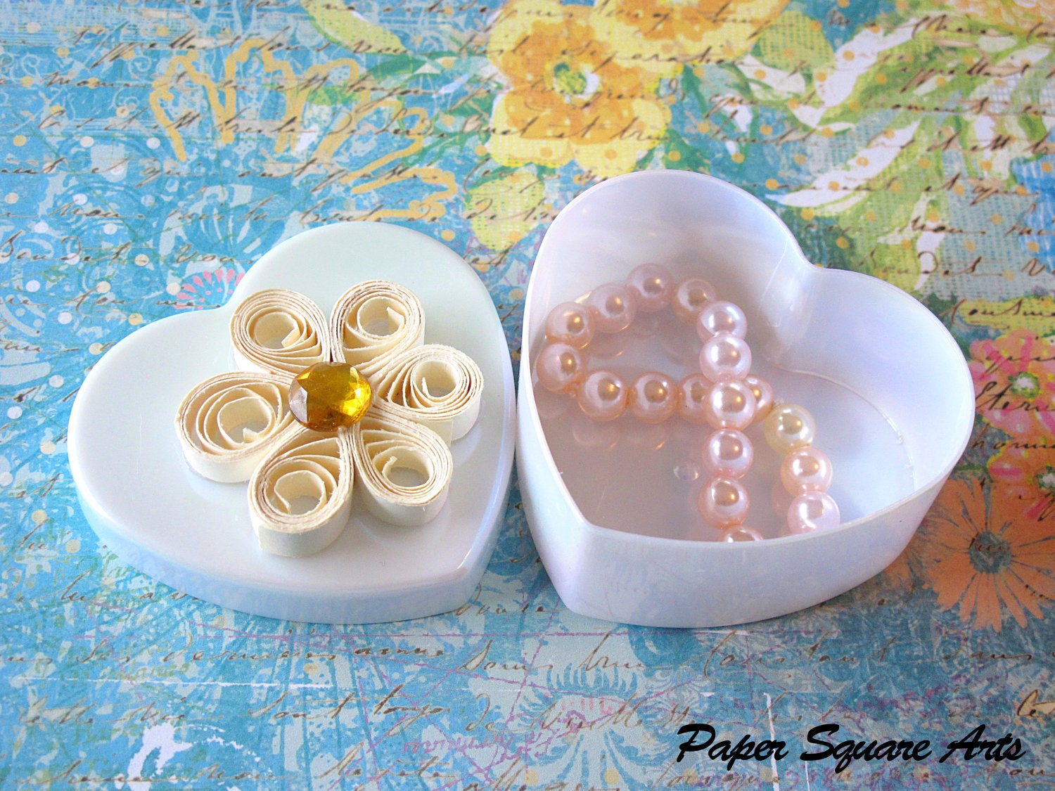 Heart shaped pearl shinny box decorated with quilled flower in white