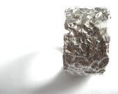 Recycled silver avocado textured band ring