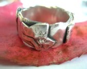 Fine silver ring with tiny ivy leaves