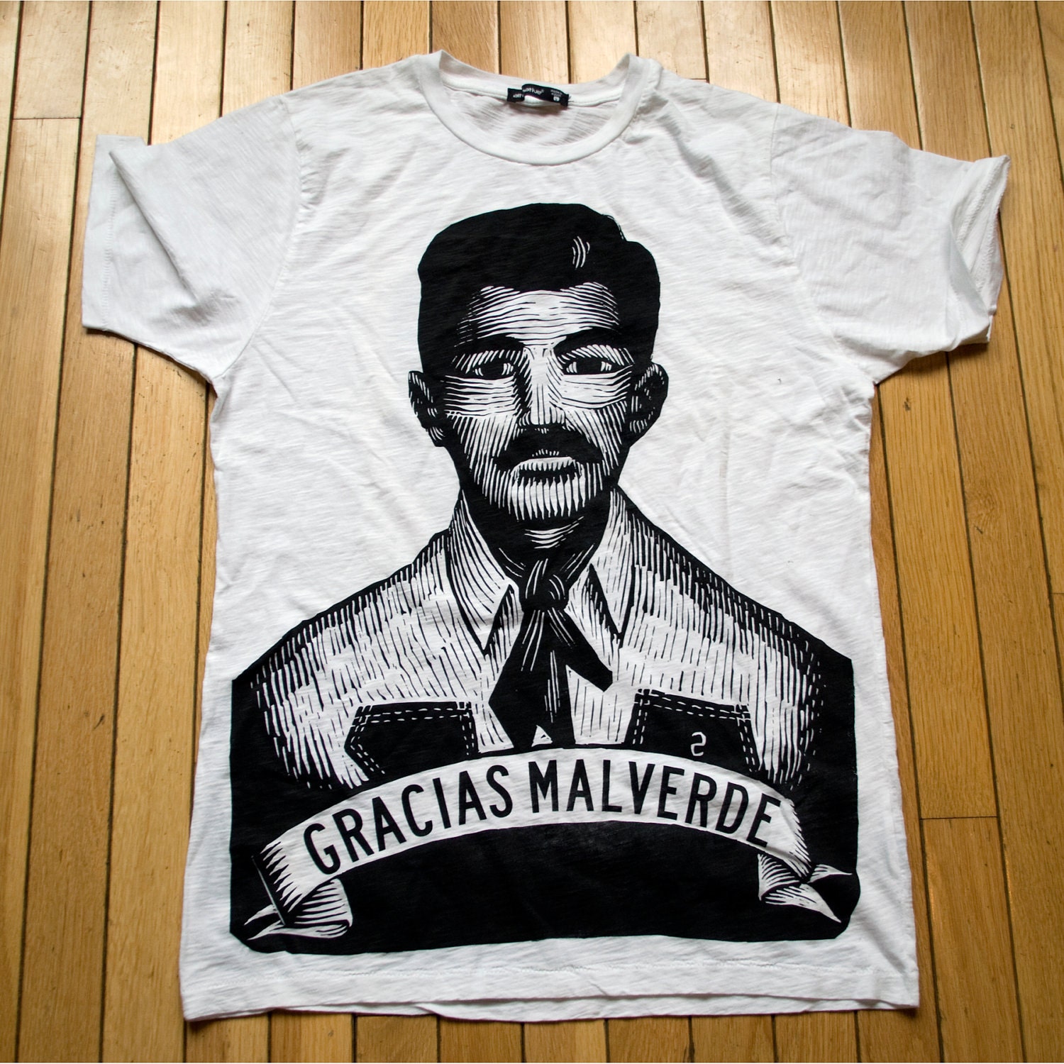 White Tee with black silkscreen image of Jesús Malverde SIZE LARGE