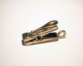 Juggling Peg Pendant (yellow bronze)