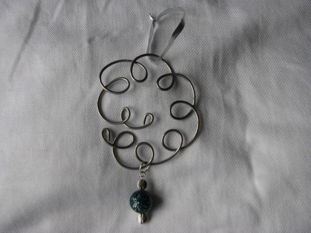 Silver ornament or suncatcher