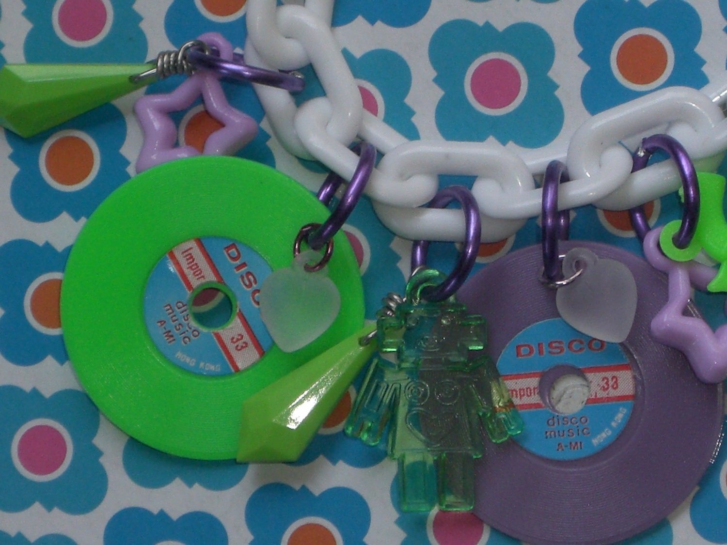 Panic at the Disco (in chartreuse, white and purple) Kitsch Kawaii Robots Disco Records 1970s Shooting Stars Plastic Pistols Charm Bracelet