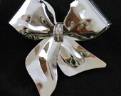 Silver Bow Brooch Pin banded with Rhinestones