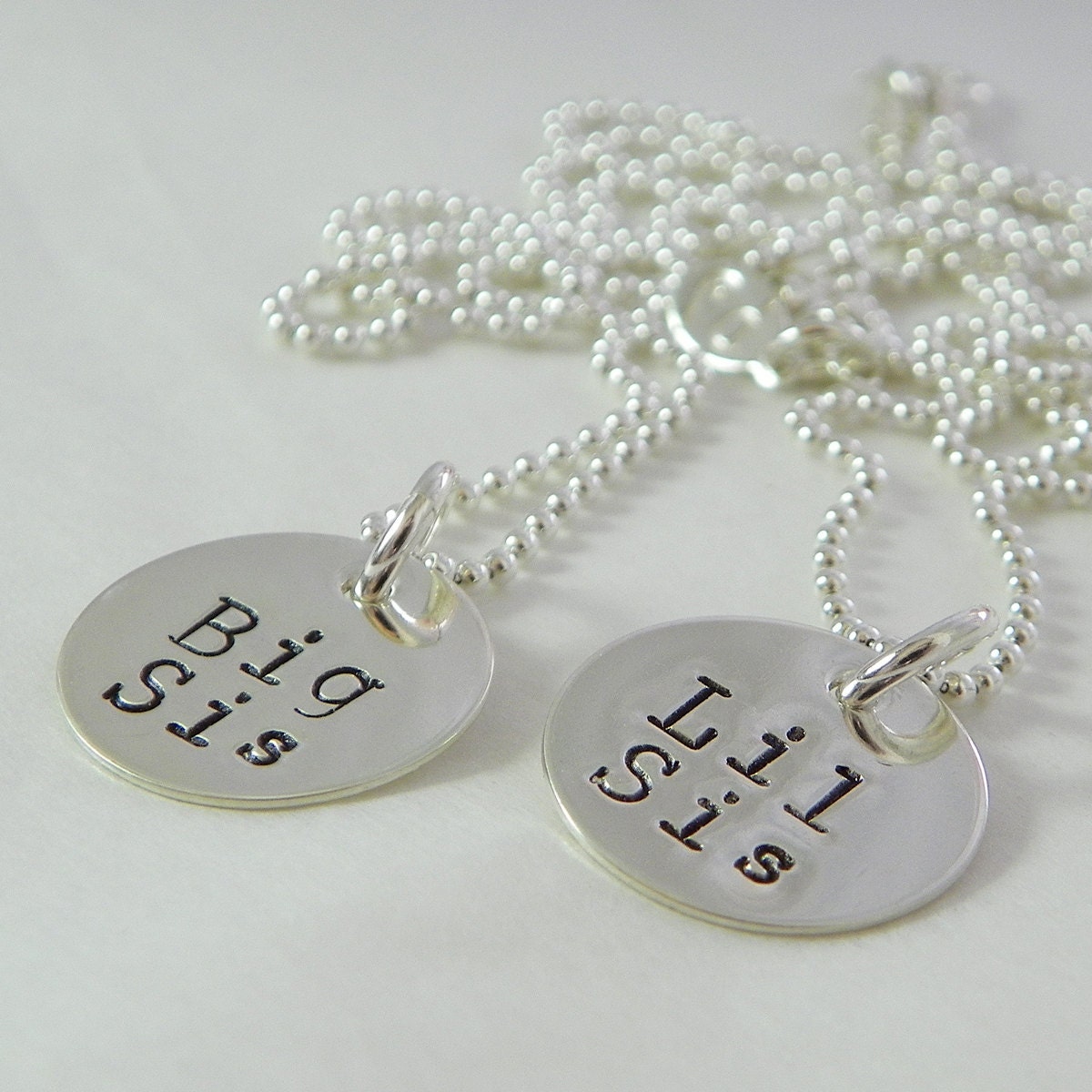 Big Sis and Lil Sis matching hand stamped sterling necklaces