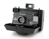 Polaroid The Reporter SE Camera Includes Original Timer and Neck Strap