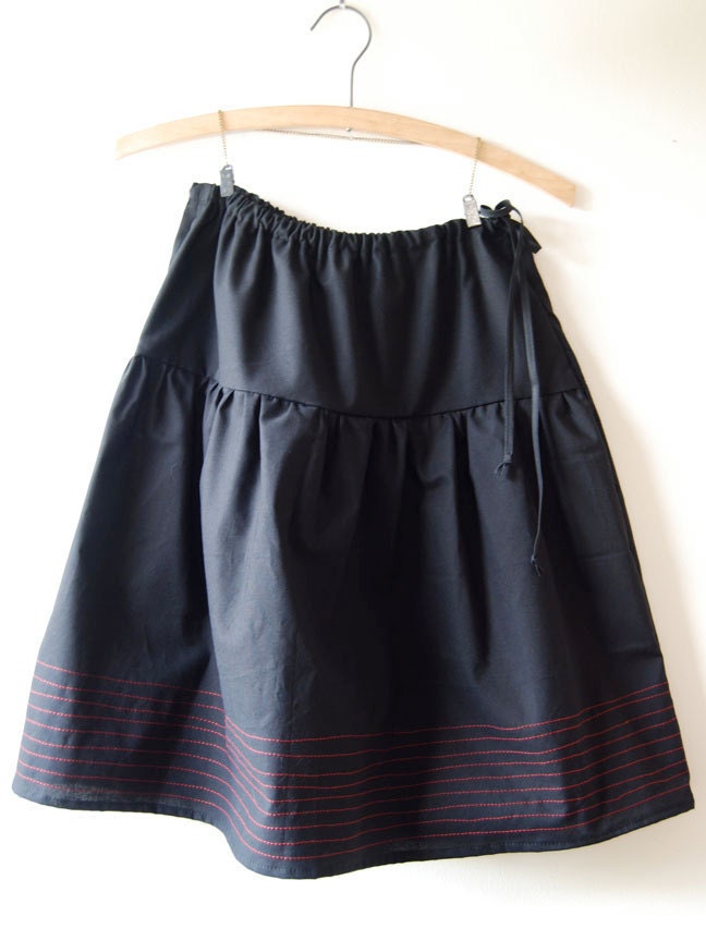 Black cotton skirt with red stitching