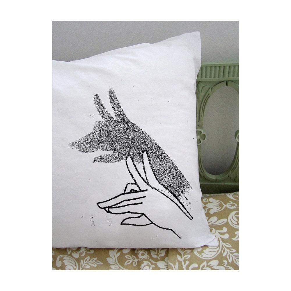 Wolf shadow puppet pillowcase. white cotton. black screenprint.