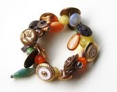Brass button bracelet, green, yellow, orange