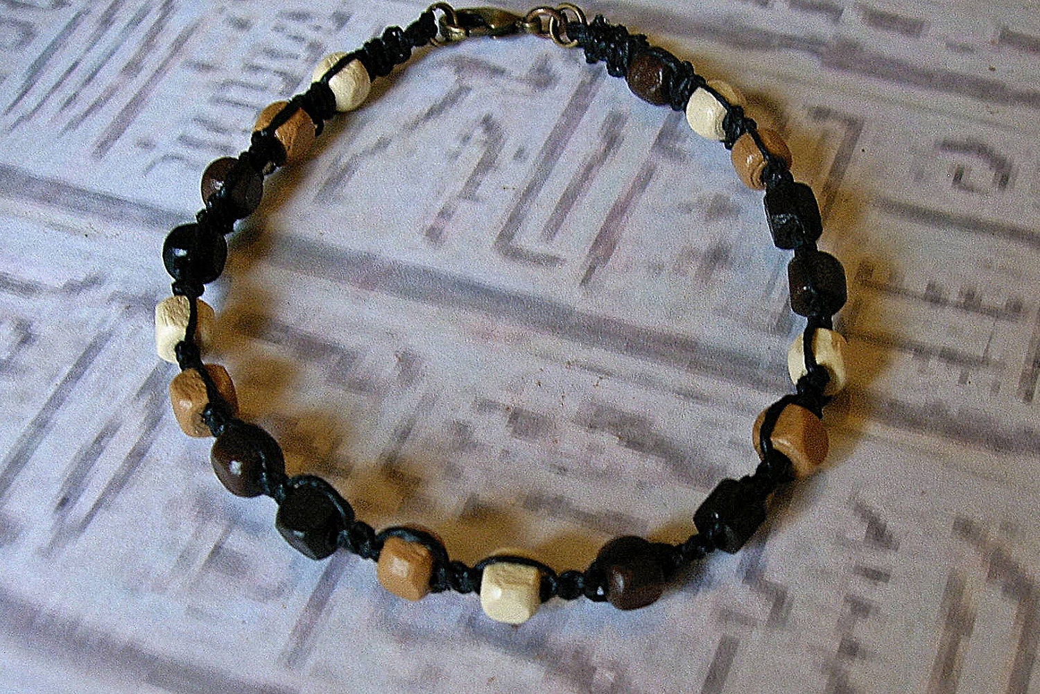 Black friendship bracelet in hemp.