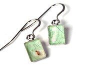 Earrings made from topographic maps of Northern Canada