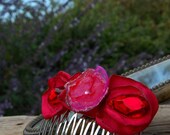 Handmade fabric flower handcrafted wearable art fabric flowers in red and pinks on a metal comb OOAKb