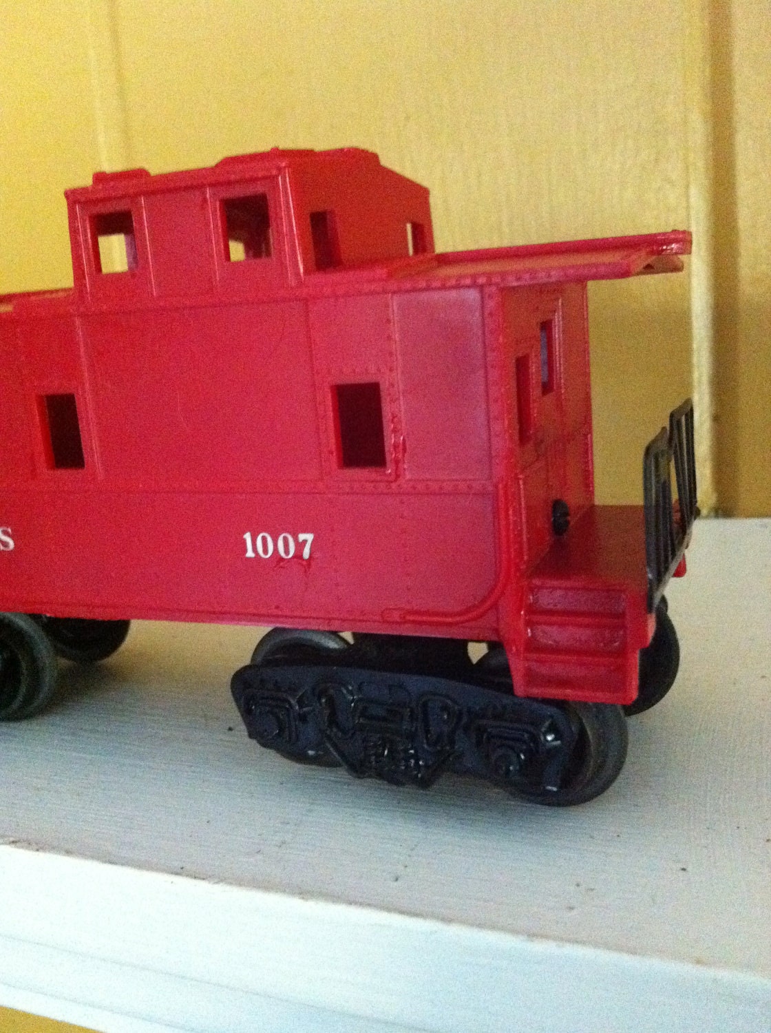 Lionel Toy Train Cars ...Vintage...All Three ..Red Caboose..Black Car and Blue Car....