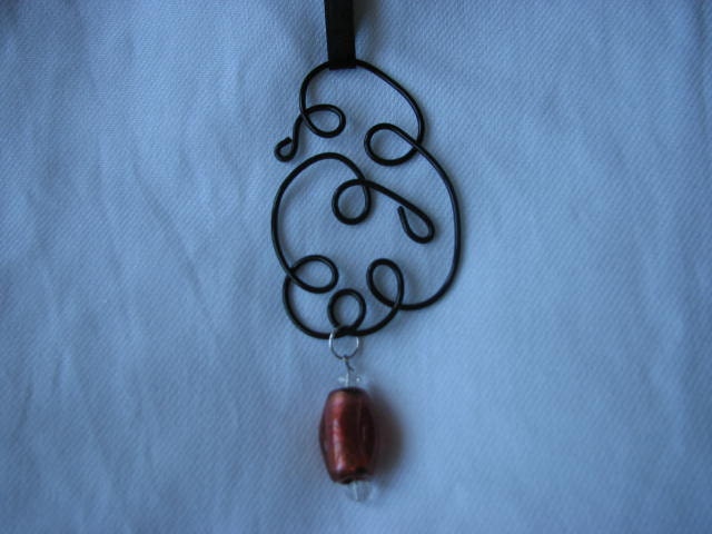 Ornament or suncatcher black swirls