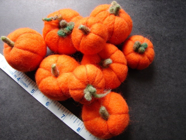 Needle felted holiday display, with this set of 9 needle felted decorative pumpkins you can create a charming display