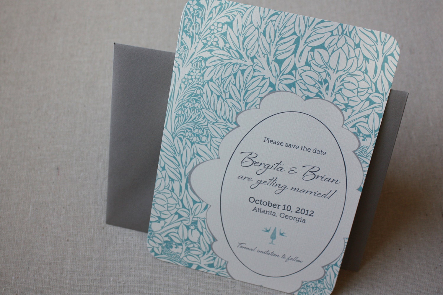 Bergita Storybook Save the Dates, set of 50 with natural woodsy tree imagery and a swirly frame