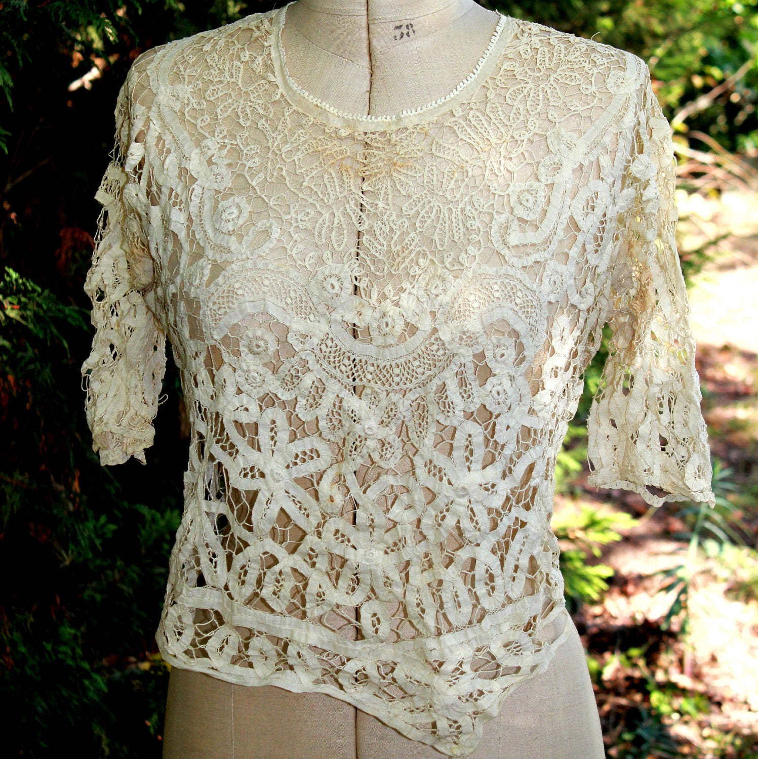 An antique 19th century handmade french lace top
