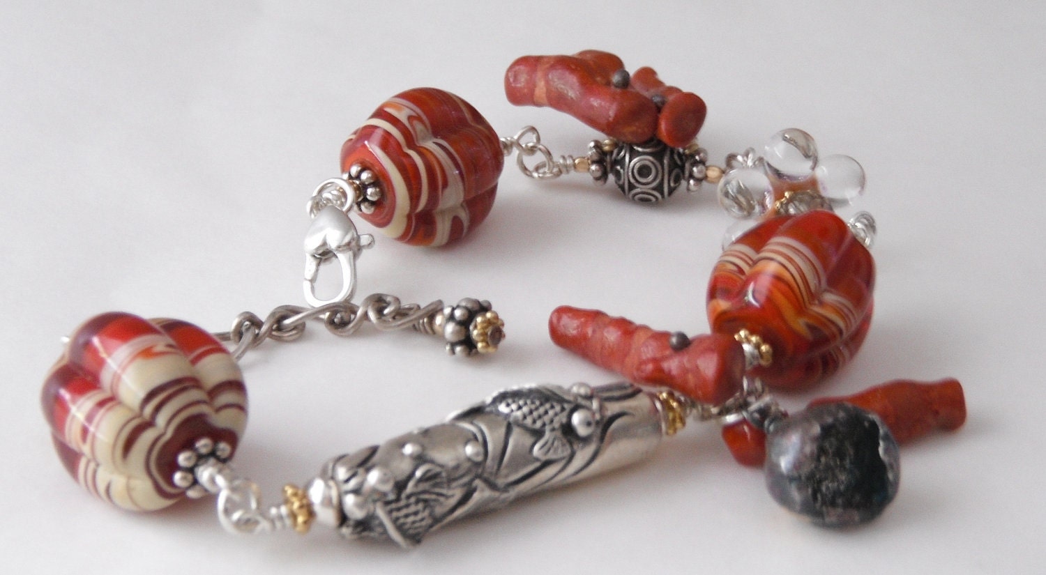 Rich, Substantial sterling silver bracelet with Koi fish bead and coral- Free Shipping Etsy- Gift under 200.