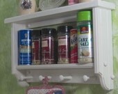 White spice rack ,plate,pegs,wall shelf,wood