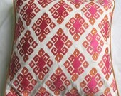 orange fushia pink diamond design on off white throw pillow 18 inch