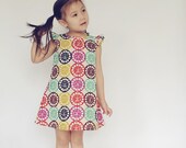 4T ruffled sleeve dress made with Melody Miller Viewfinders fabric