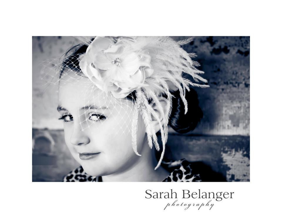 Breathtaking Ivory feather fascinator with birdcage veil for your Flower Girl