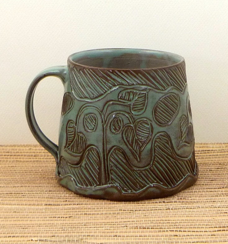 Handmade carved ceramic mug