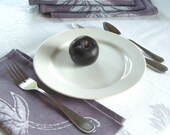 four dinner napkins. muted black plum purple