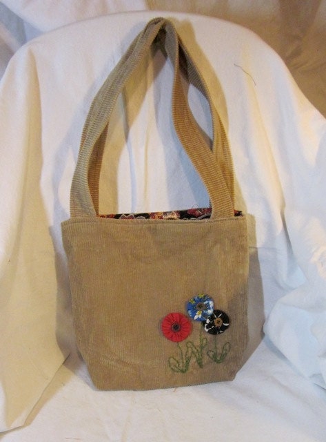 Funky corduroy bag with yoyo flowers