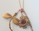 Vintage charm necklace with a rhinestone chain, vintage leaf charm & "recycled"  clip-on earring from the 1940's as focal piece