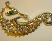 Gold rhinestone seahorse brooch
