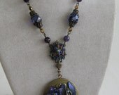 Victorian BLUE FAERIE - Art Nouveau style handpainted Signed vintage brass locket set with Amethyst gemstone OOAK