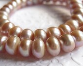 8mm pink freshwater pearls, center drilled buttons, full strand 15 inches, last one