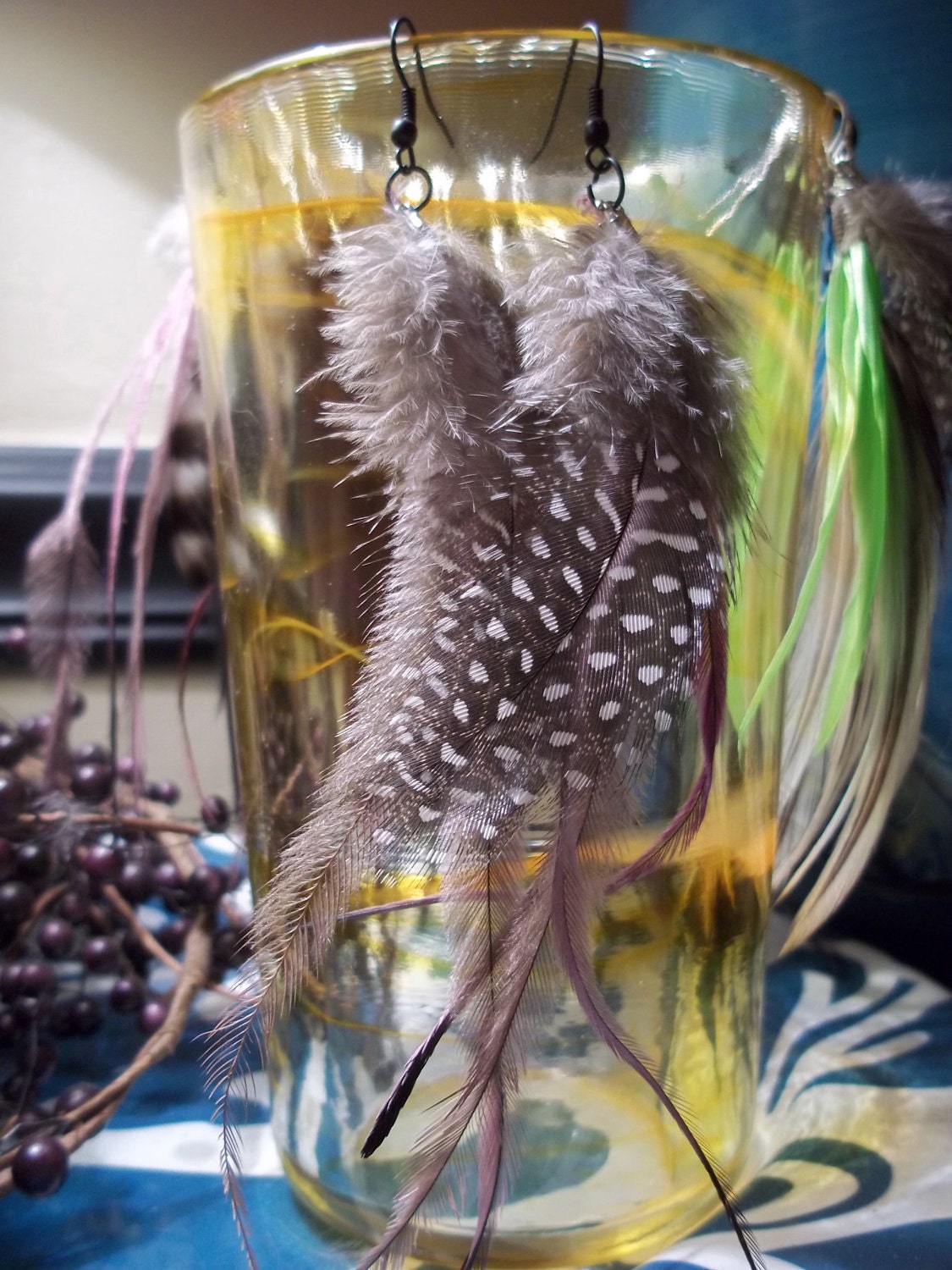 feather earrings naturally molted lavender and polka dot
