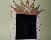 Framed crown mirror