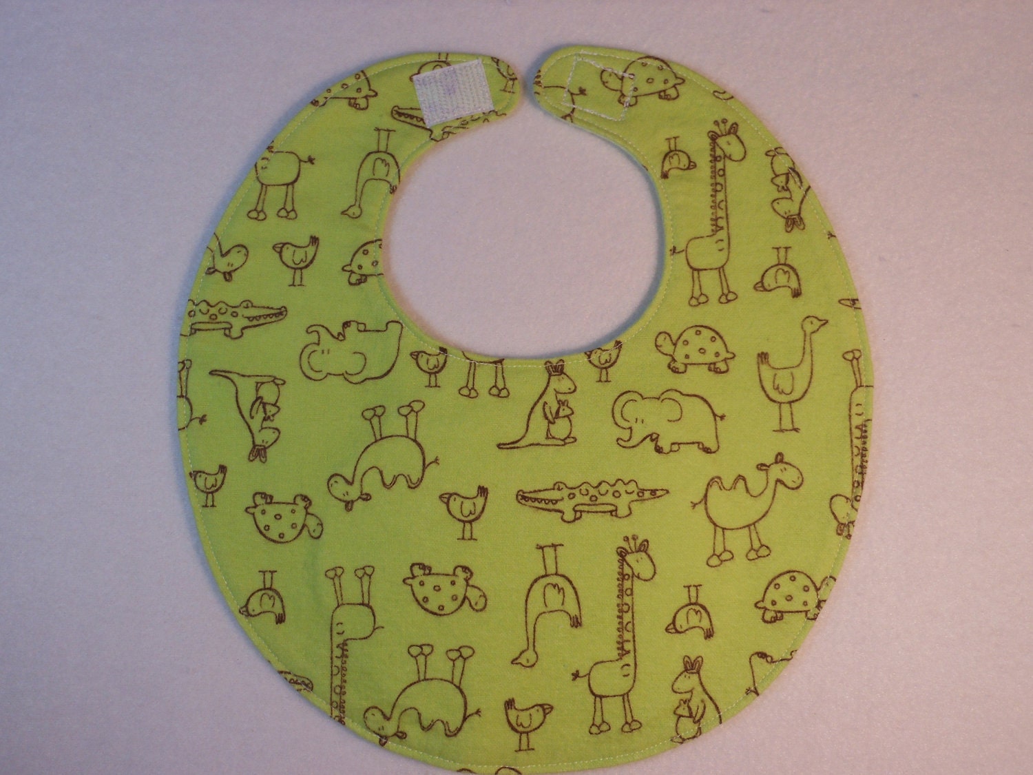 Baby Bibs, four soft layers, reversible, green with the cutest critters