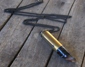 Freak Show. Black banded Agate talon and bullet shell necklace. Unisex