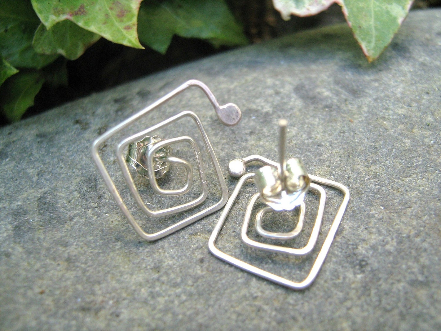 Post Earrings in sterling silver, square spirals