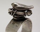 Bird in nest ring