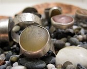 River stone rings with forged silver bands