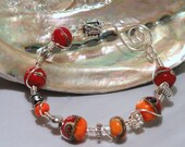 Turn Up The Heat Crimson Red Orange Bracelet Wire Wrapped Lampwork Bead