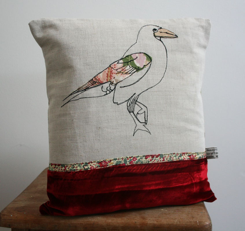 Bird cushion with velvet trim and vintage fabric back