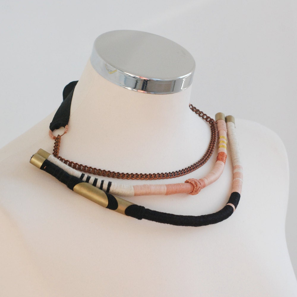 Tribal statement fiber and metal necklace