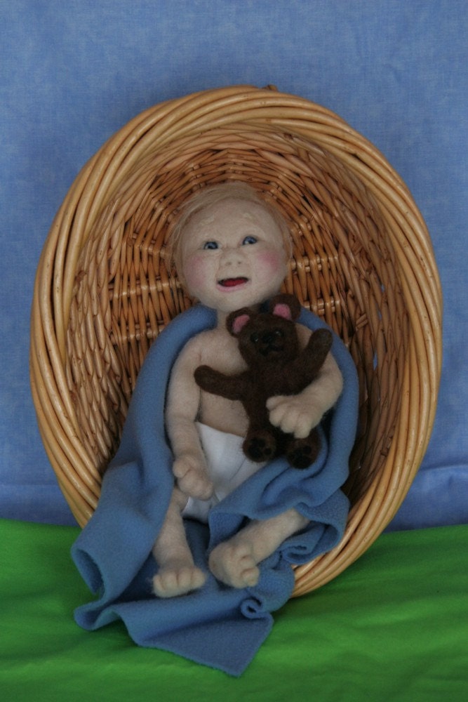 Baby boy with teddy bear