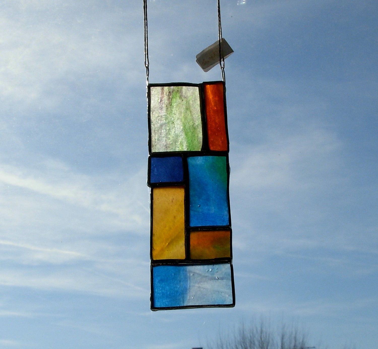 from orange to violet in seven steps, a suncatcher
