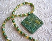 Gothic Rosette Green Pearl Polymer Clay Necklace