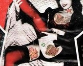 framed tattooed bettie page collage