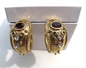 VINTAGE / ANTIQUE gold tone purple rhinestone earrings