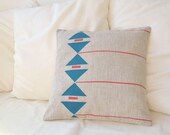 Grey linen pillow cover with geometric design in deep emerald green and red Inspired tribal patterns