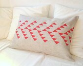 Natural linen pillow cover with geometric design in red inspired by tribal pattern